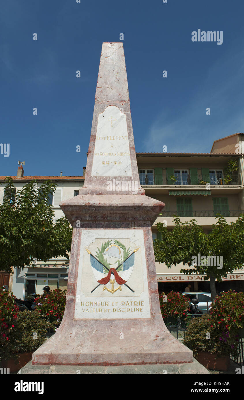 Corsica: the pink obelisk dedicated to the city of Saint Florent, popular summer vacation spot of Haute-Corse, to its glorious dead of the 1914-1918 Stock Photo