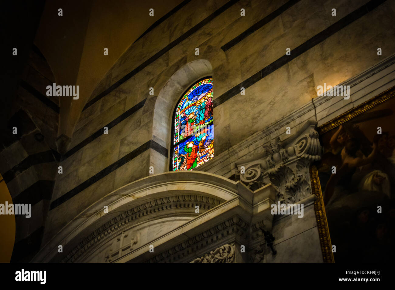 A colorful stained glass window in the Pisa Duomo on the Piazza dei Miracoli  in the Tuscan city of Pisa, Italy Stock Photo - Alamy