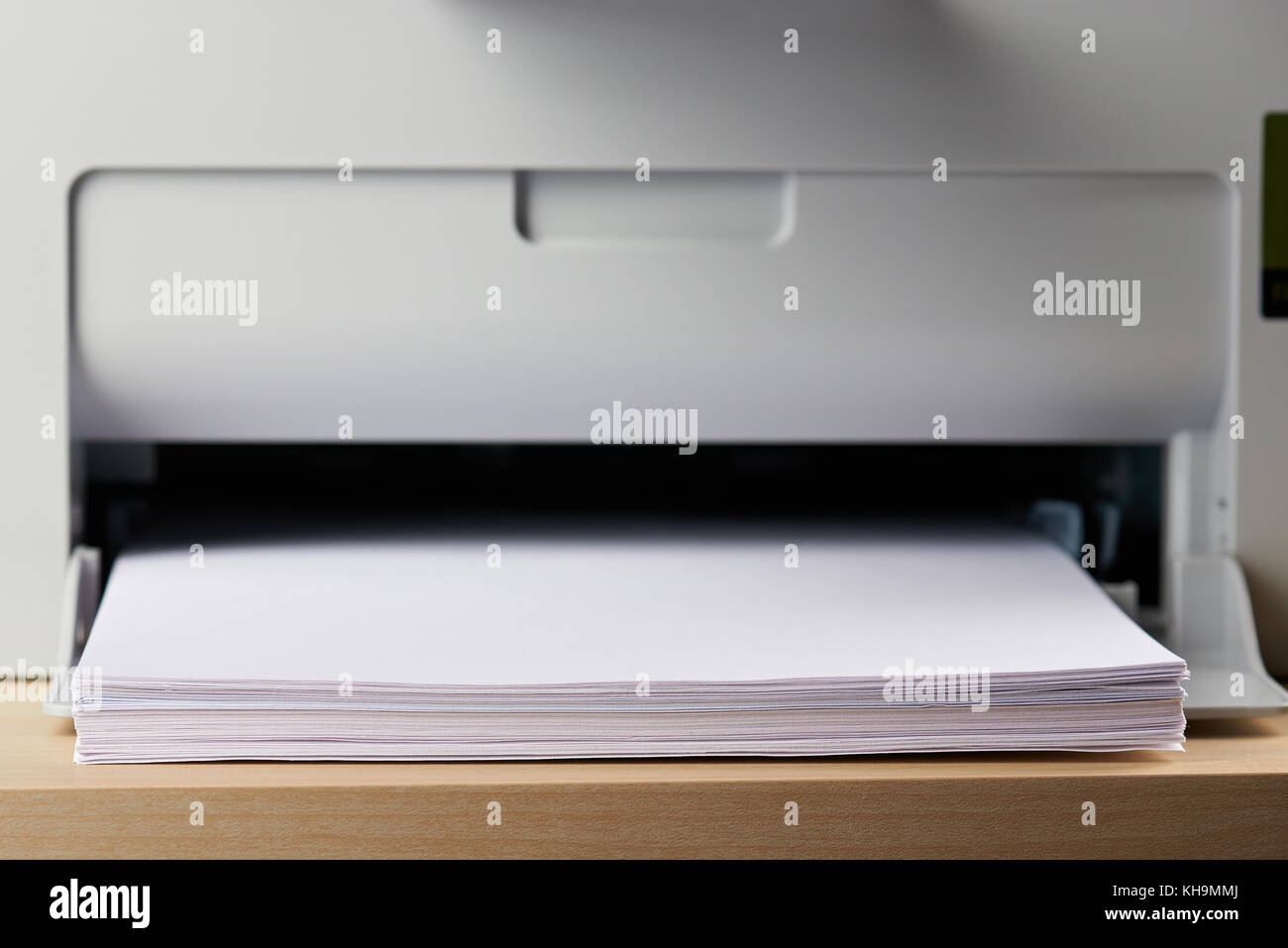 Loading paper in printer tray close up concept Stock Photo Alamy