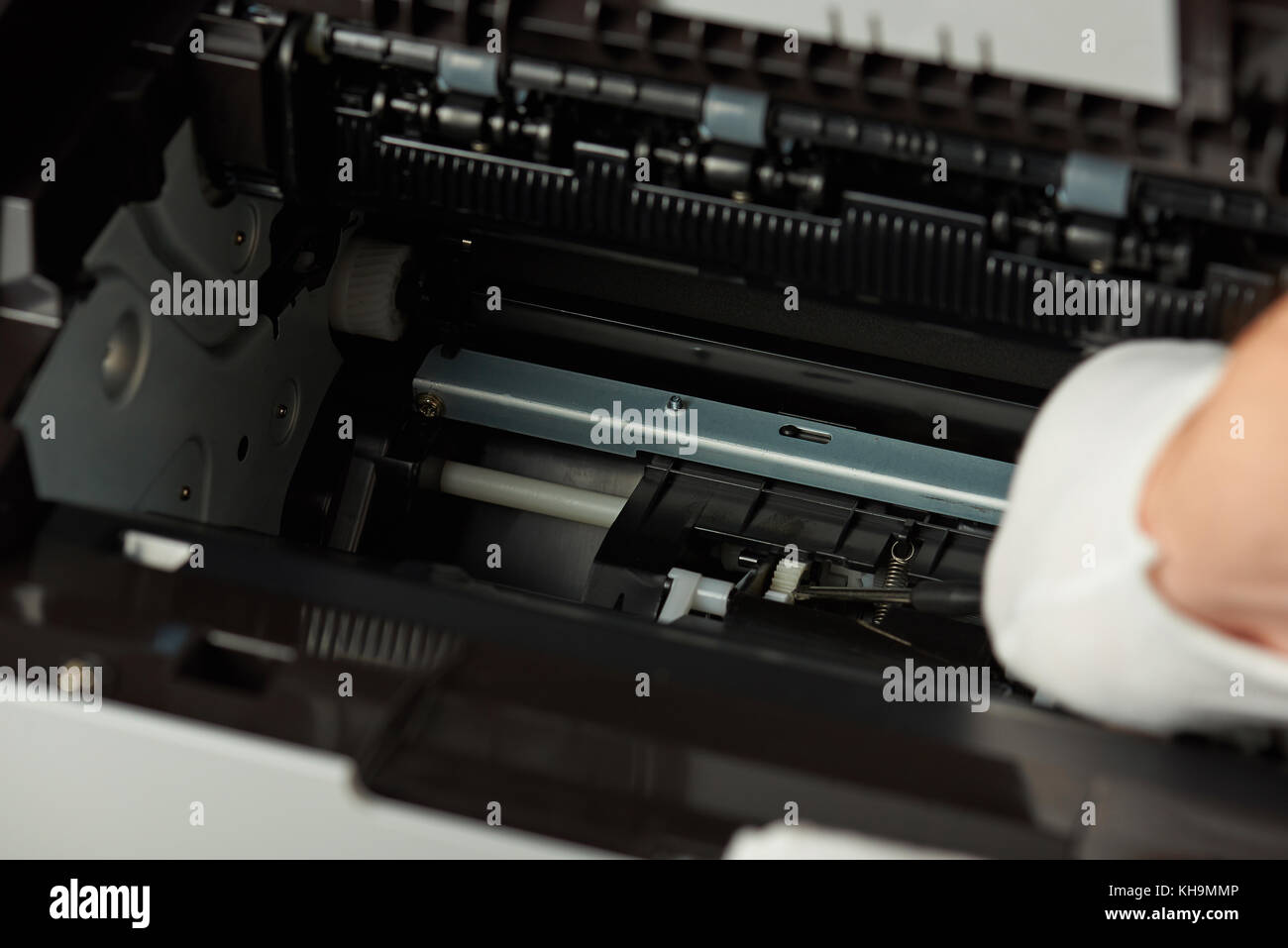 Checking modern printer mechanism. Repair printer service Stock Photo