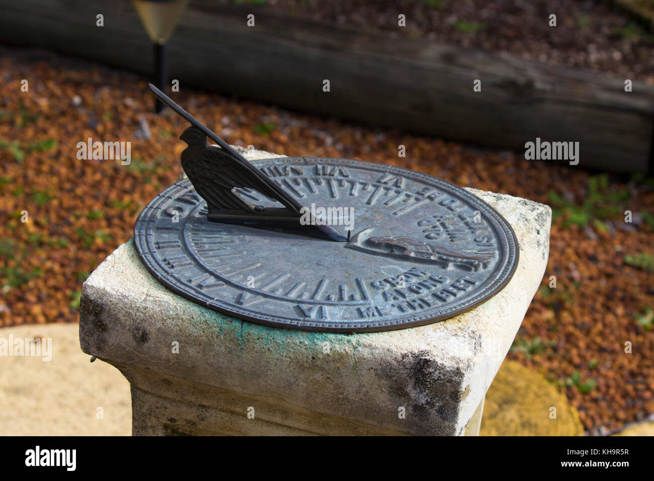 Old metallic solar sun clock inscription Grow old along with me the