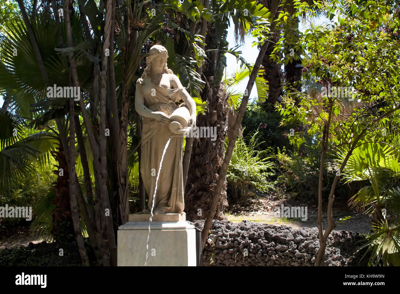 View of a statue of woman pouring water at Parco Maestranze (public park) in Catania city of