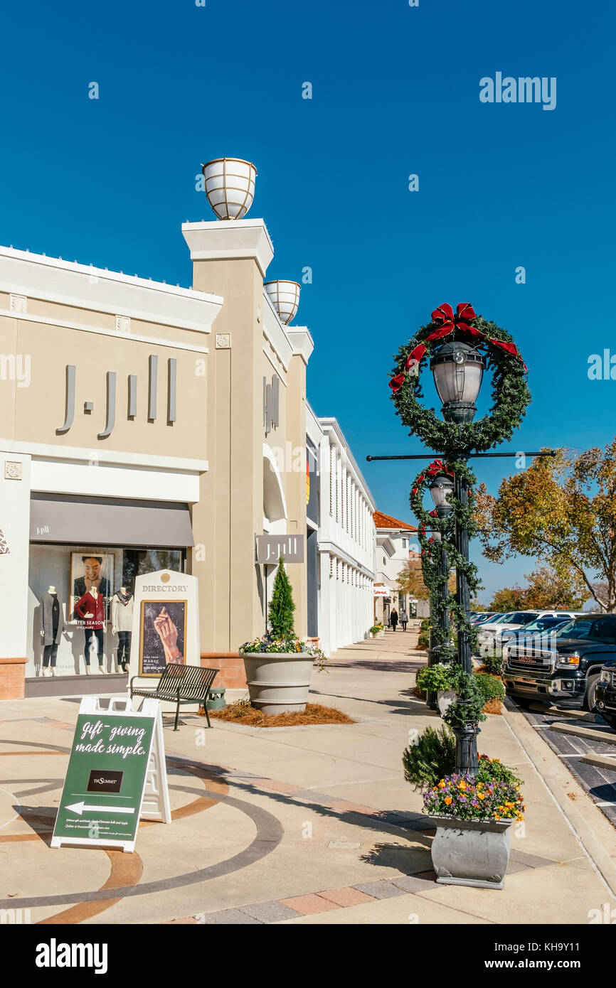 Sidewalk of The Summit shopping center decorated for Christmas holiday season with J-Jill store in background. Birmingham, Alabama USA Stock Photo