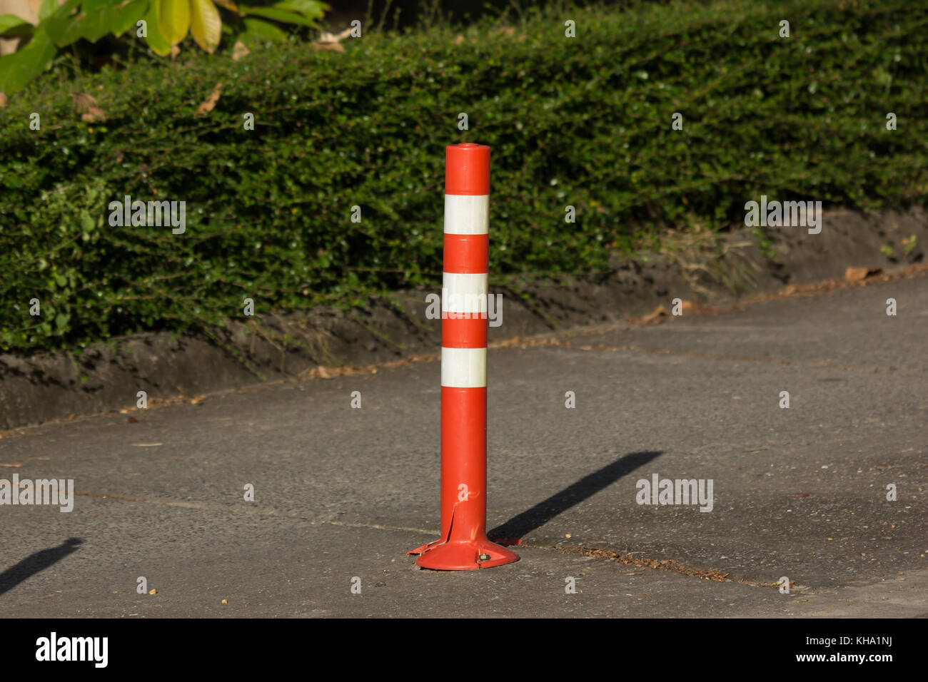 Close up of Orange traffic pole on road for safety Area Stock Photo - Alamy