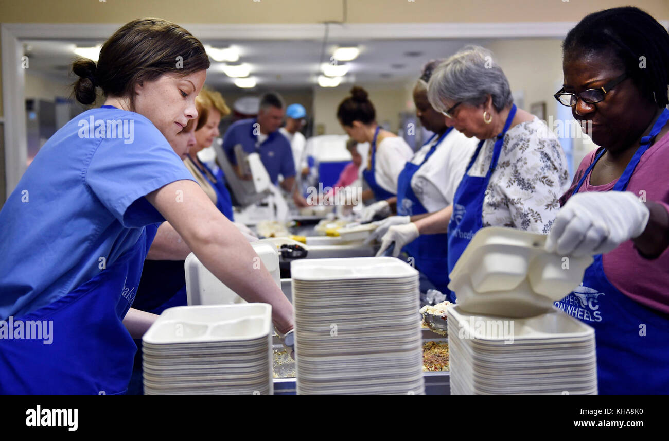 East Cooper Meals on Wheels volunteers prepare food for residents in ...