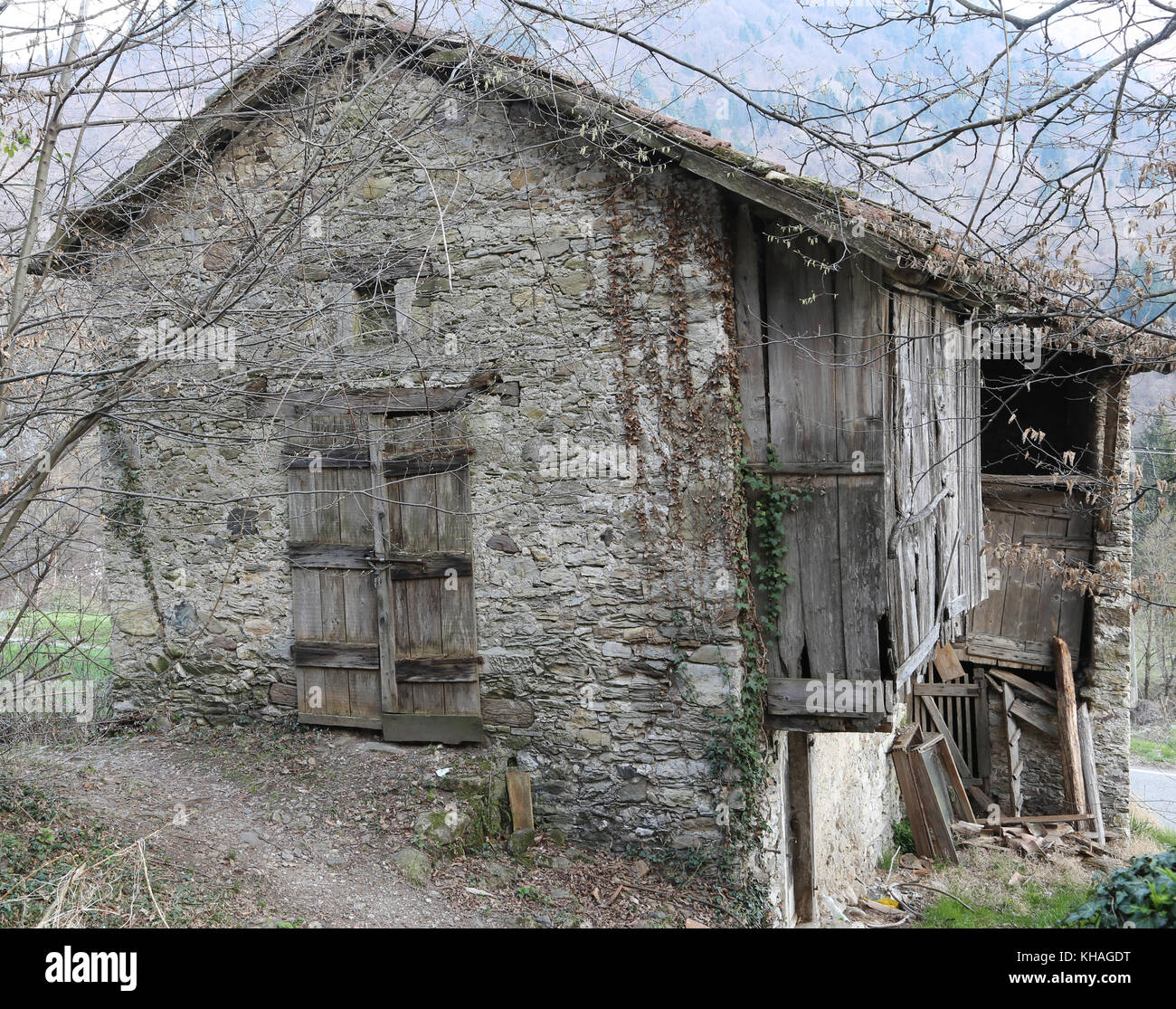 abandoned wooden and stone house in a mountain village Stock Photo - Alamy