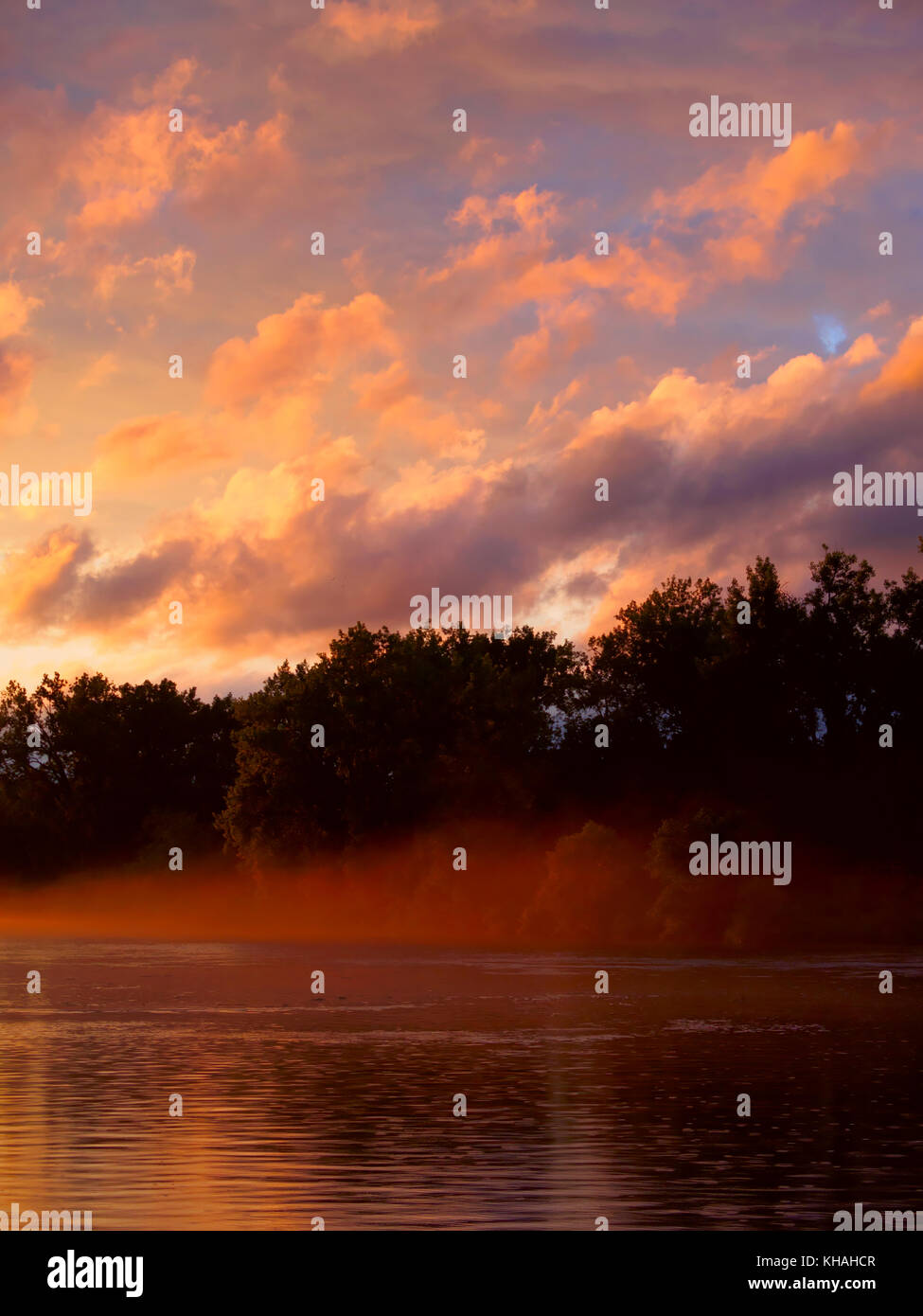 Mist at sunset on the Erie Canal near Utica, New York Stock Photo