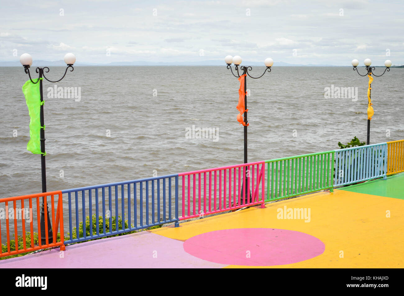 Colorful pier by the shore of Lake Managua, aka Lago Xolotlan, by the capital of Nicaragua. Central America Stock Photo