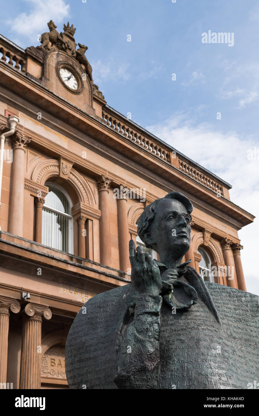 W.B. Yeats statue, created by sculptor Rowan Gillespie, outside the Ulster Bank in Sligo, Ireland Stock Photo