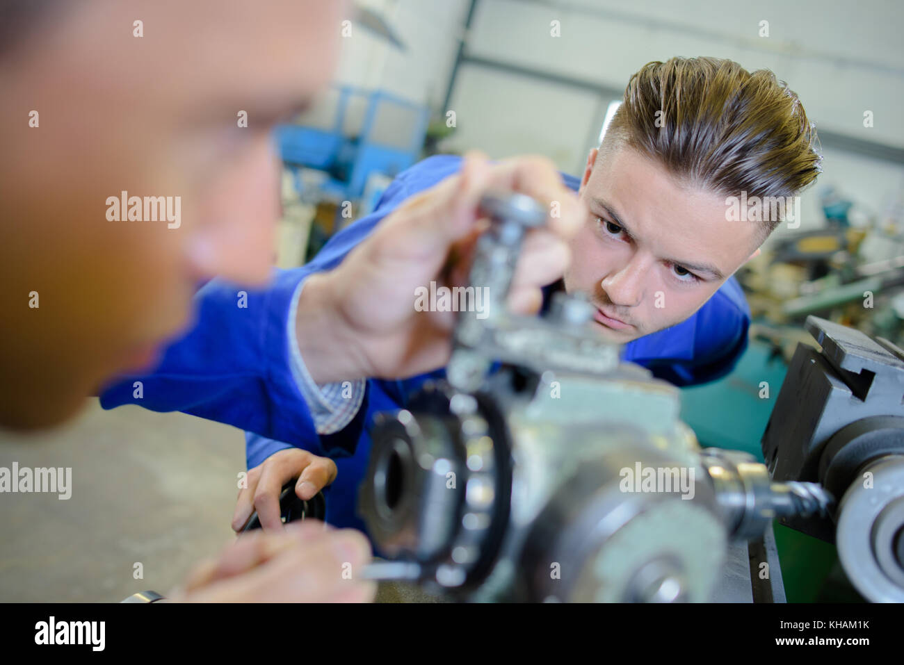 young machine assembler Stock Photo Alamy