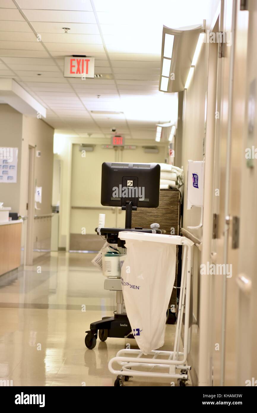 Hospital hallway with cleaning supplies Stock Photo
