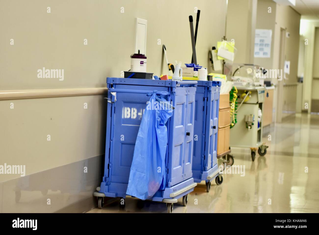 Hospital hallway with cleaning supplies Stock Photo