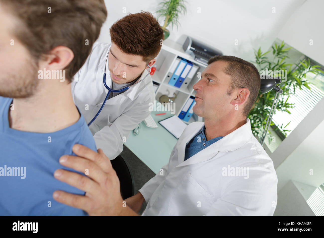 internist doctor learning on the job Stock Photo