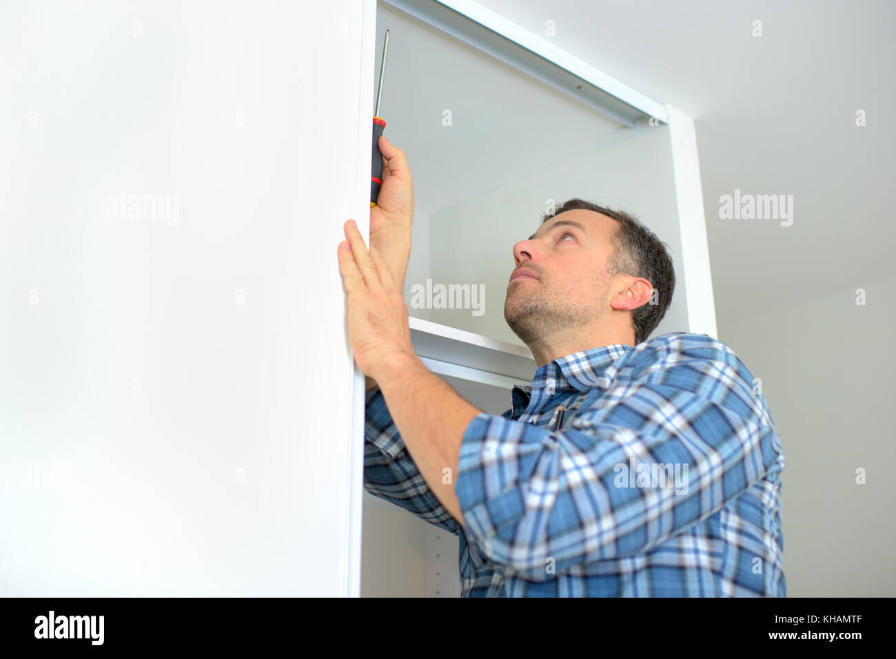 Installing shelves hires stock photography and images Alamy