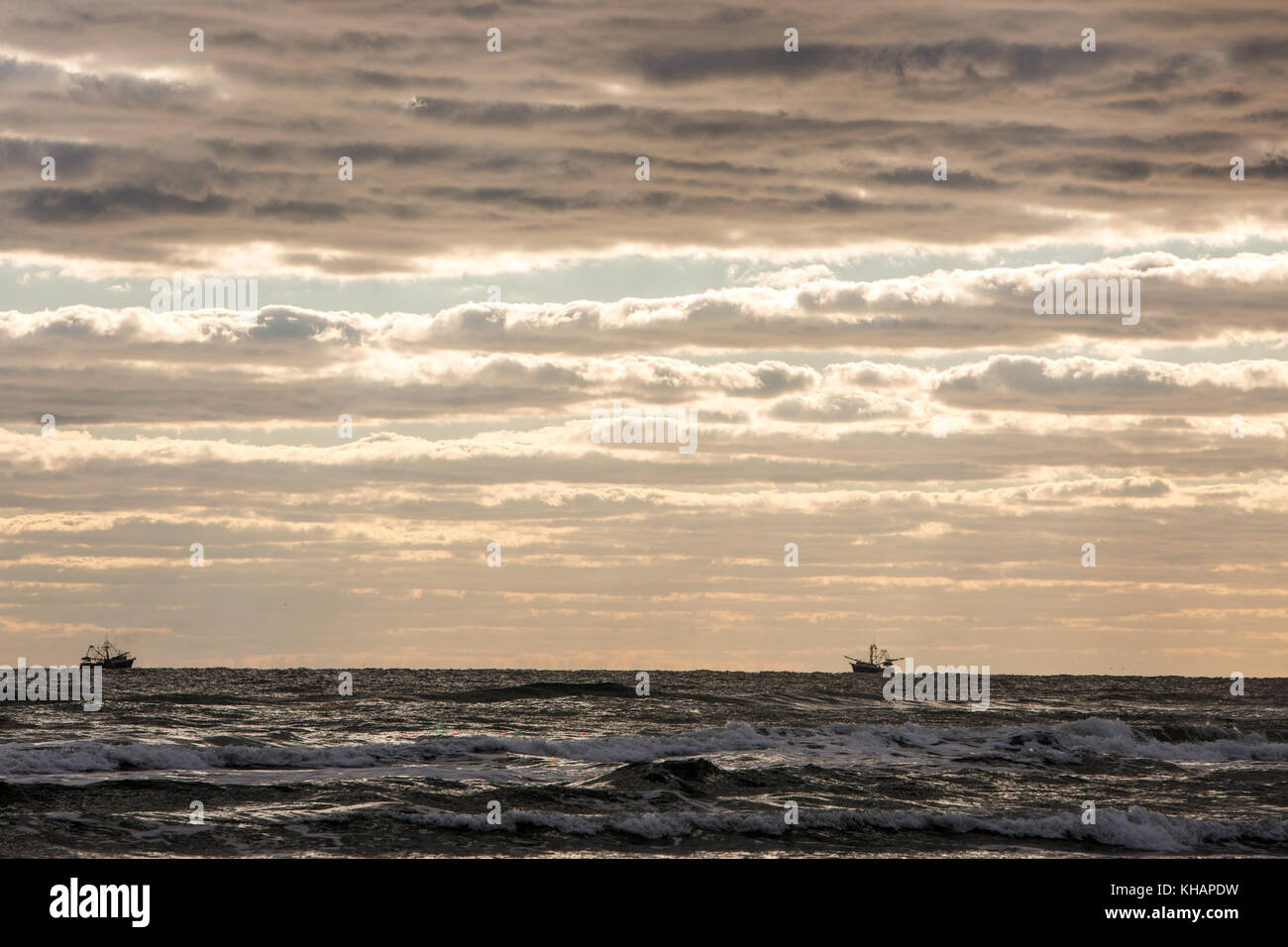 Commercial Fishing Boat Working the Atlantic Ocean in Daytona Beach, Florida. Stock Photo