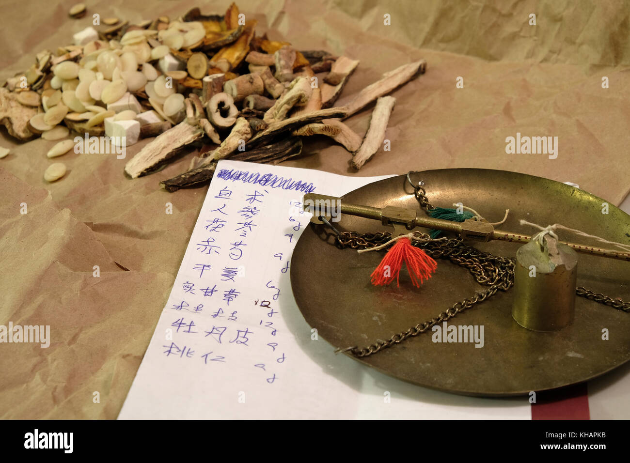 Chinese herbal medicine with written prescription in Chinese characters