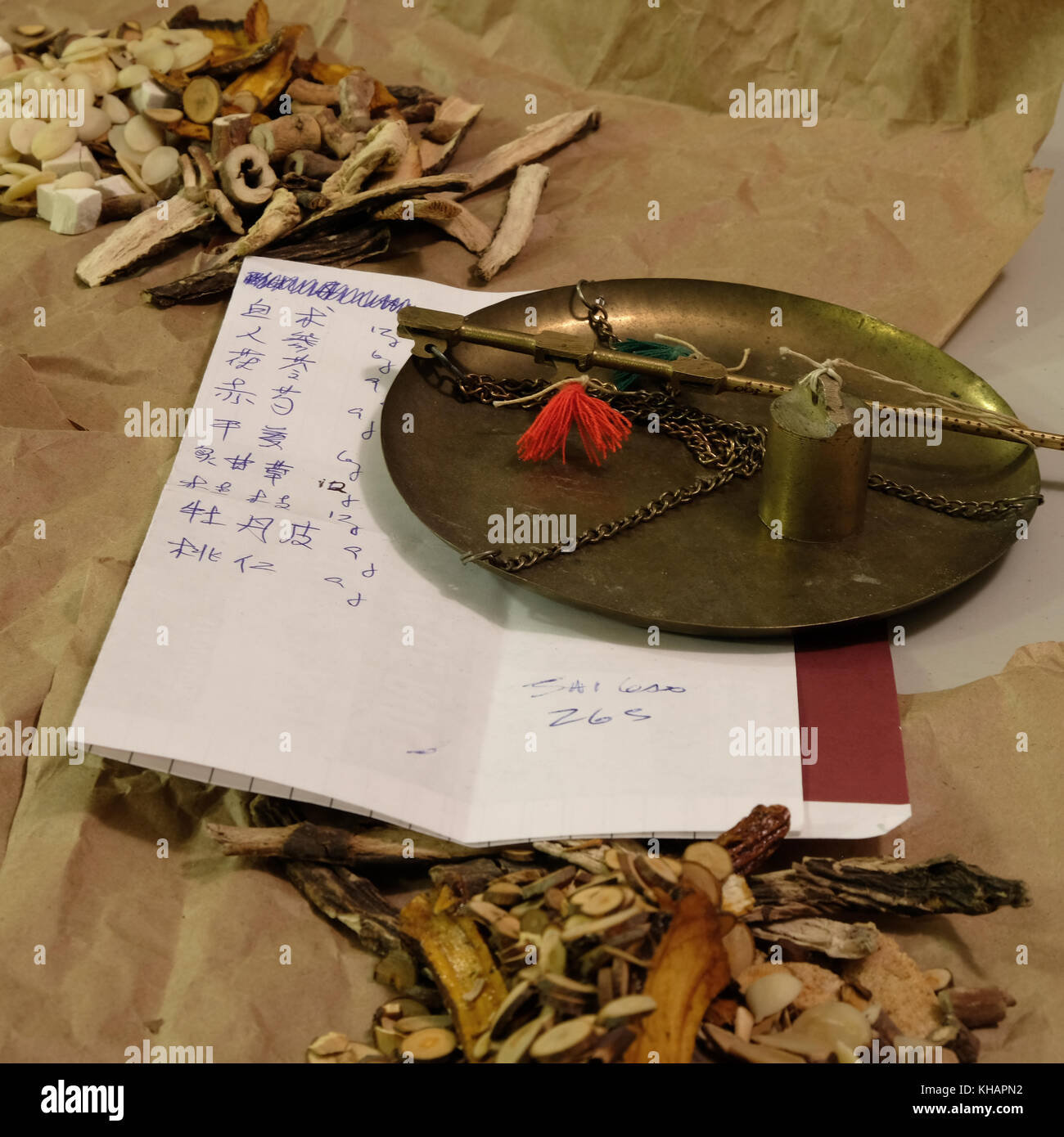 Chinese herbal medicine with written prescription in Chinese characters