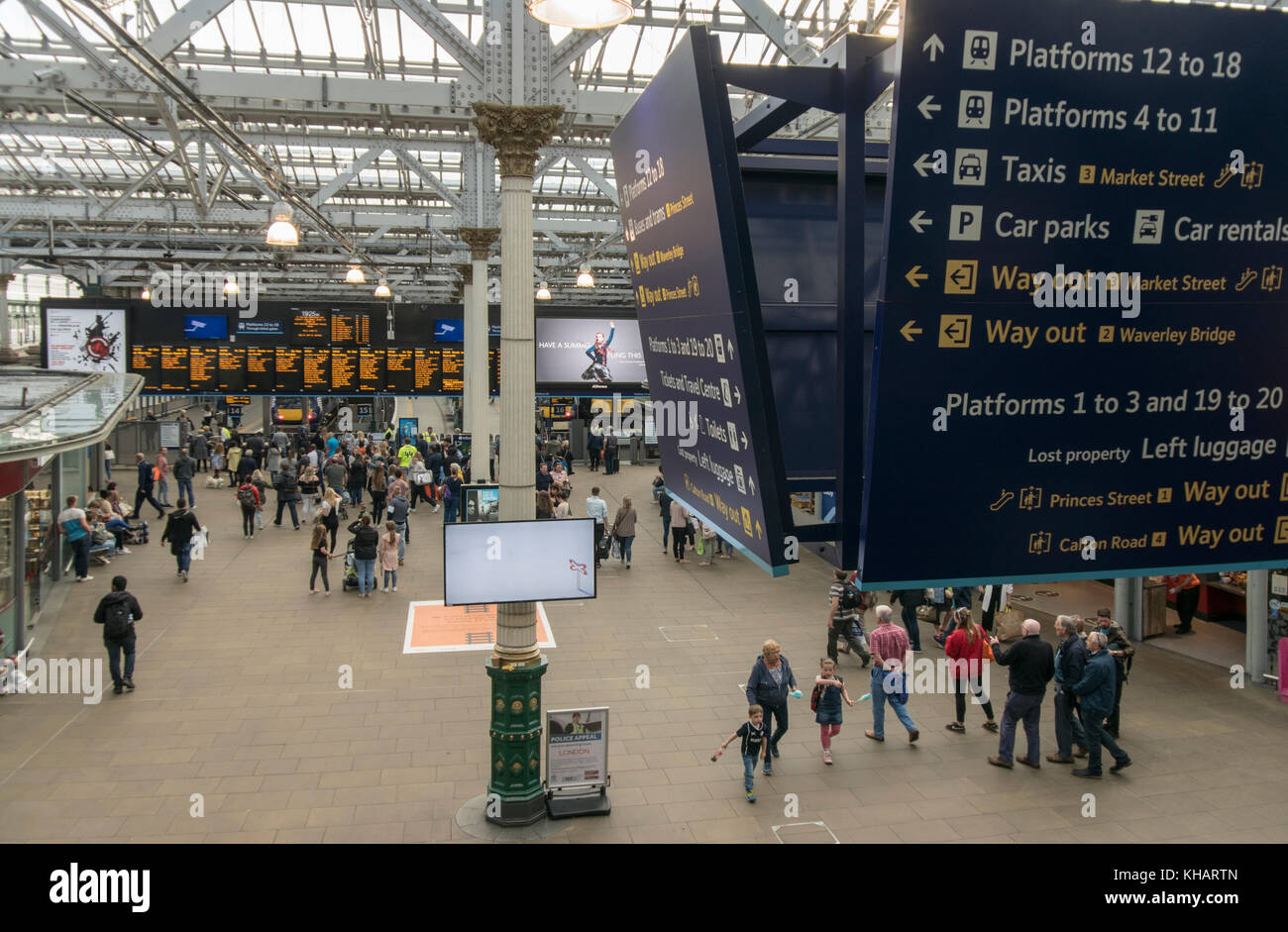 New station signage over the main concourse at Waverley Station, Edinburgh,Scotland,UK Stock Photo