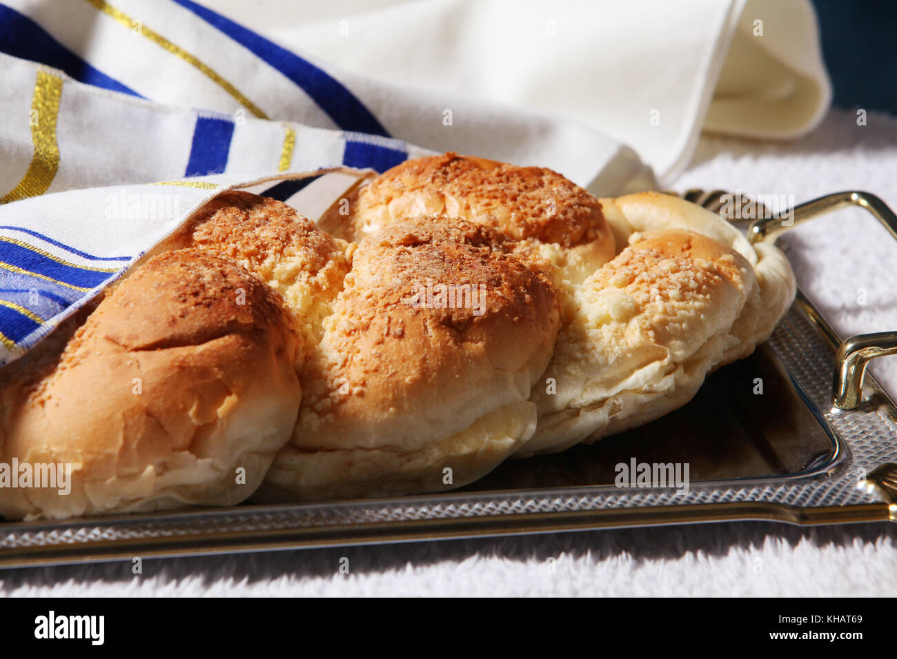 Hot plate for the Sabbath. Pot with traditional food and challah-special  bread in Jewish cuisine. Traditional food Jewish Shabbat Stock Photo - Alamy