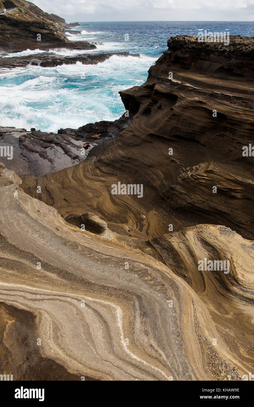 The layered rocks look like pancake stacks near the Lanai Lookout on the southeastern shore of O'ahu along Kalanianaole Highway #72 Stock Photo