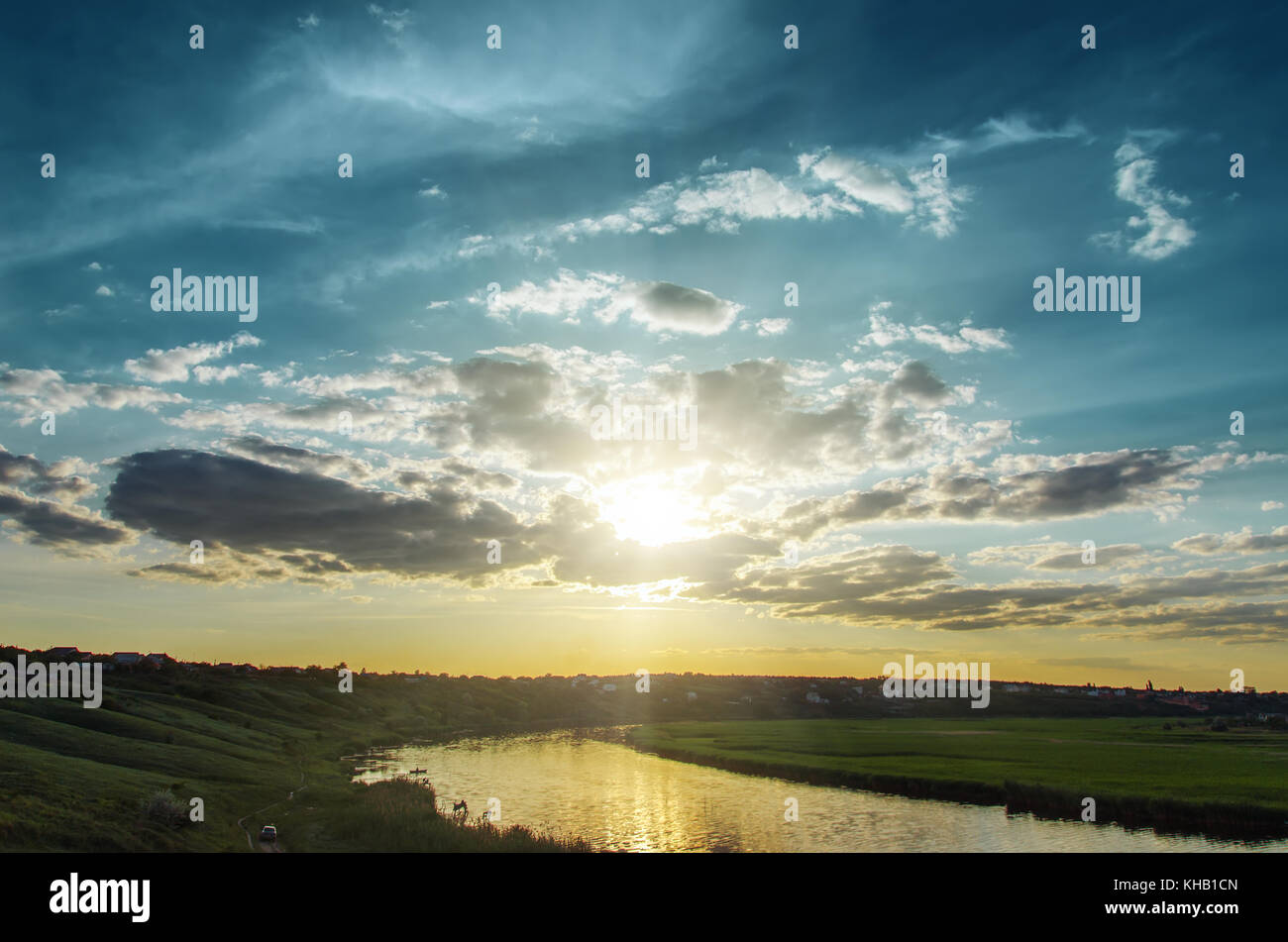 dramatic sunset over river Stock Photo - Alamy
