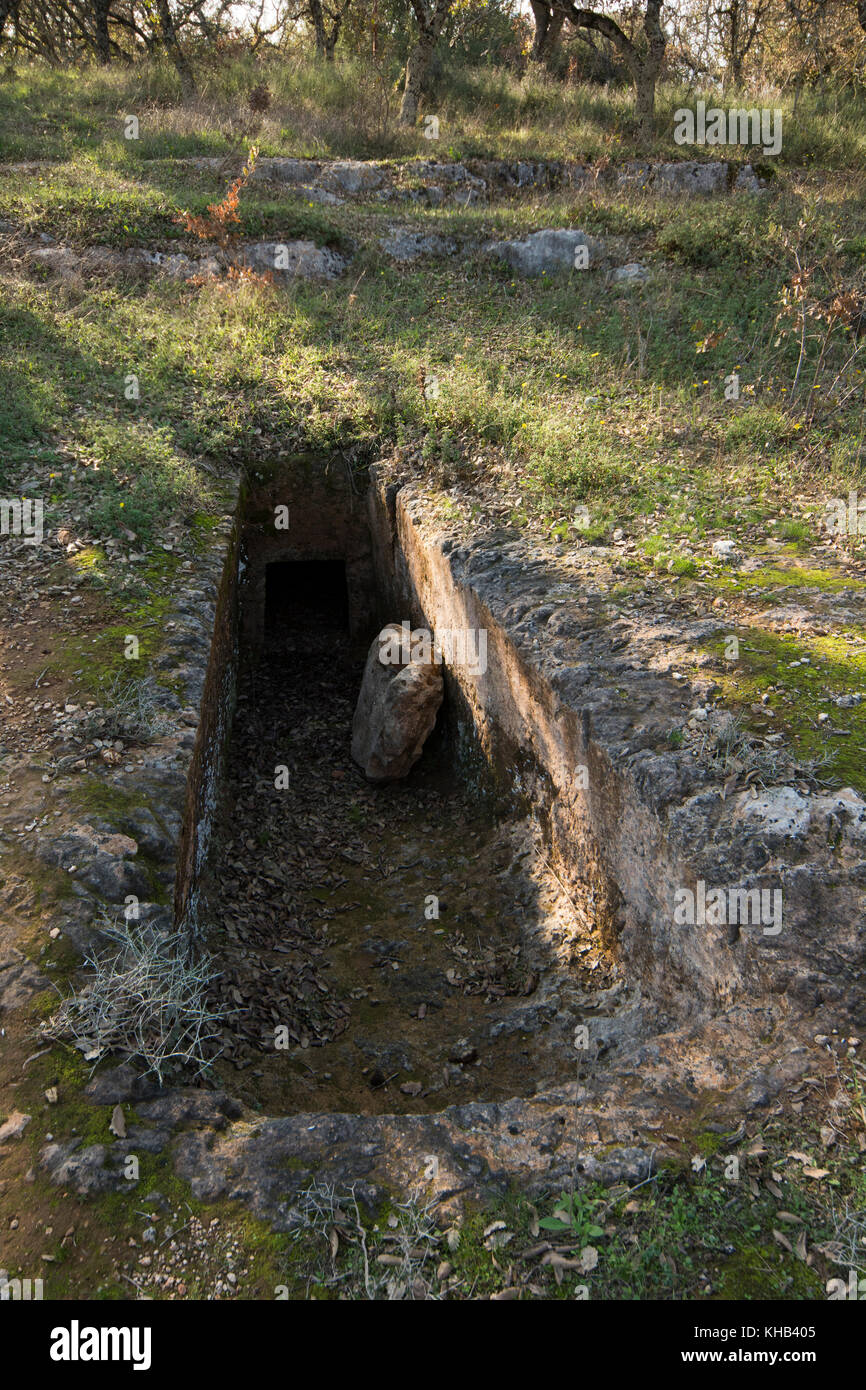 The nekropolis of Armeni was a late Minoan cemetery in an oak tree forest in the mountains of Crete with over 230 chamber tombs with corridors dug in  Stock Photo