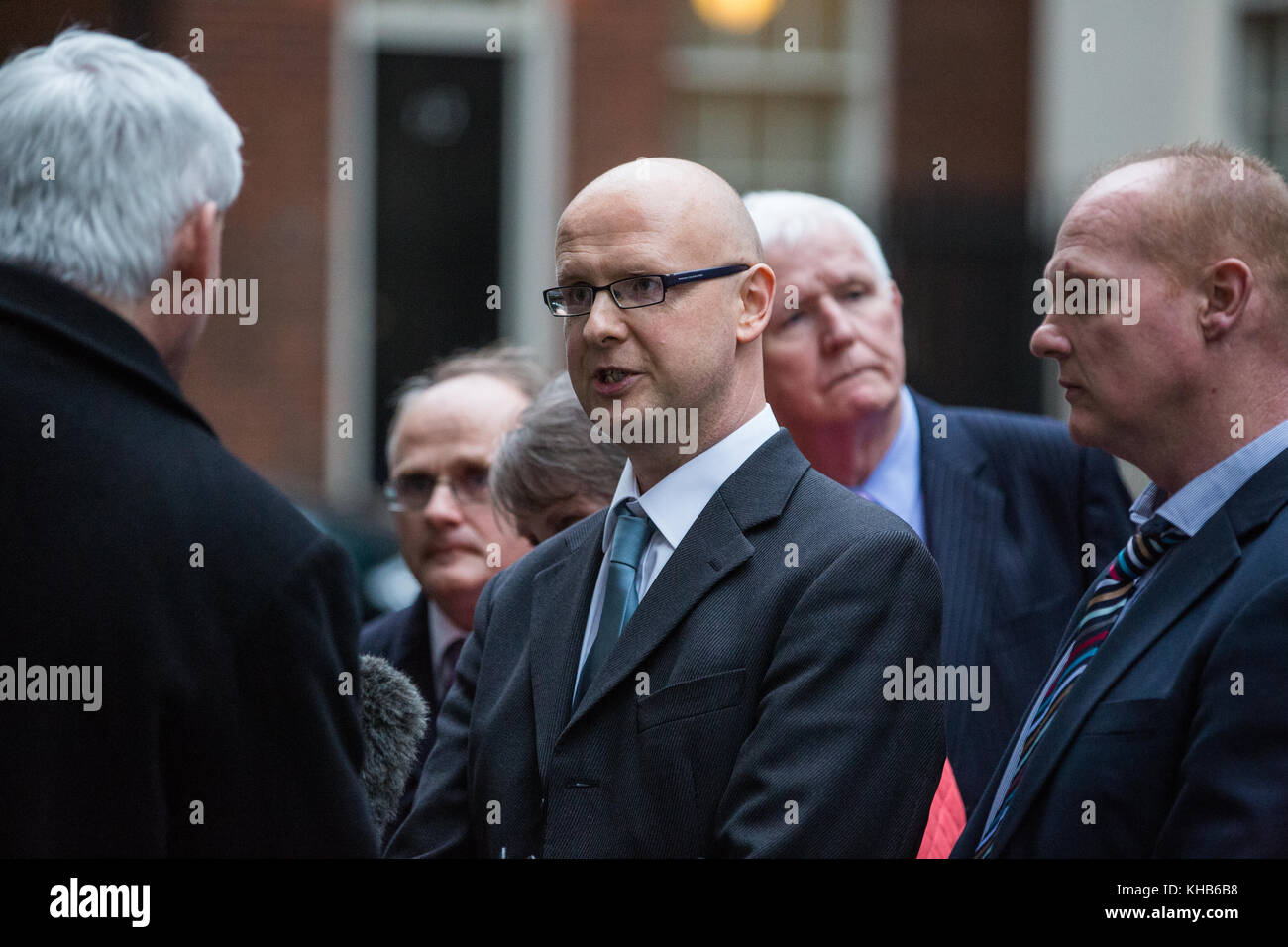 London, UK. 14th Nov, 2017. A delegation including Sinn Fein MPs Barry McElduff and Francie Molloy is interviewed by the media in Downing Street having presented a petition regarding the 1974 killing of Patsy Kelly, 33, a member of Omagh District Council, and having met James Brokenshire, Secretary of State for Northern Ireland. The Police Ombudsman is still investigating the death of the father-of-five after the original RUC investigation was heavily criticised. No one has ever been charged regarding his killing. Credit: Mark Kerrison/Alamy Live News Stock Photo