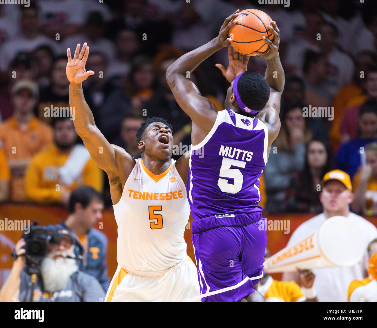 University of Tennessee, Tennessee November 14, 2017: Justyn Mutts #5 of the High Point Panthers shoots the ball over Admiral Schofield #5 of the Tennessee Volunteers during the NCAA basketball game between the University of Tennessee Volunteers and the High Point University Panthers at Thompson Boling Arena in Knoxville TN Tim Gangloff/CSM Stock Photo