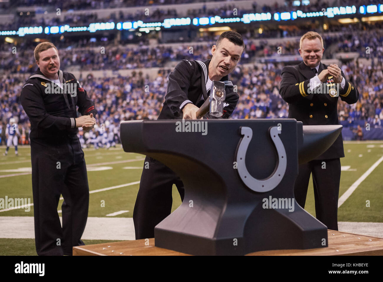 Indianapolis, Indiana, USA. 12th Nov, 2017. November 12th, 2017 - Indianapolis, Indiana, U.S. - A member of the U.S. Navy hits a large Indianapolis Colts anvil with a sledge hammer before an NFL Football game between the Pittsburgh Steelers and the Indianapolis Colts at Lucas Oil Stadium. Credit: Adam Lacy/ZUMA Wire/Alamy Live News Stock Photo
