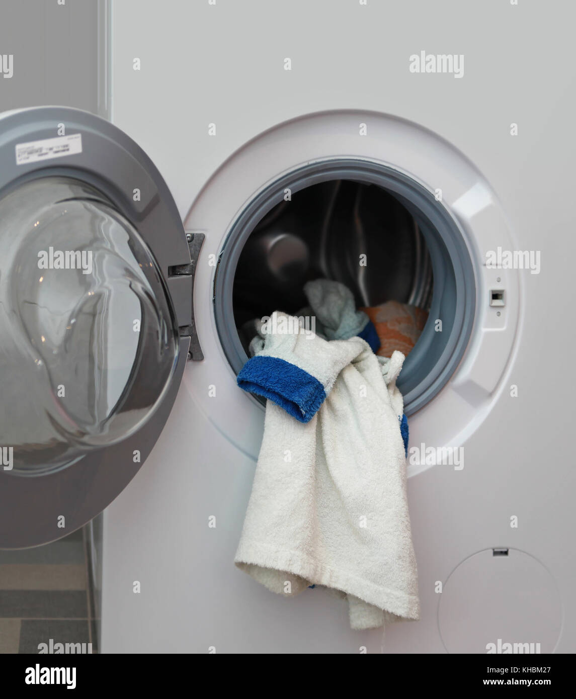 white dressing gown in the washing machine Stock Photo Alamy