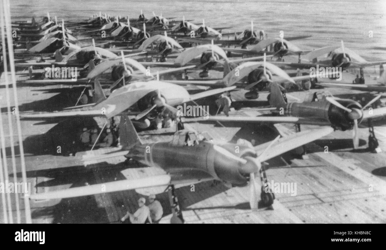Aircraft are prepared for a morning sortie on the Imperial Japanese Navy aircraft carrier Zuikaku, east of the Solomon Islands, on May 5, 1942. On May 7 and 8 the carrier was involved in exchanges of airstrikes with United States Navy carriers during the Battle of the Coral Sea. Stock Photo