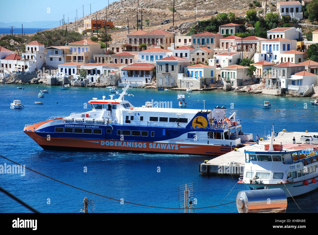 Dodekanisos Seaways catamaran ferry Dodekanisos Express moored at Emborio harbour on the Greek island of Halki on June 7, 2010. Stock Photo