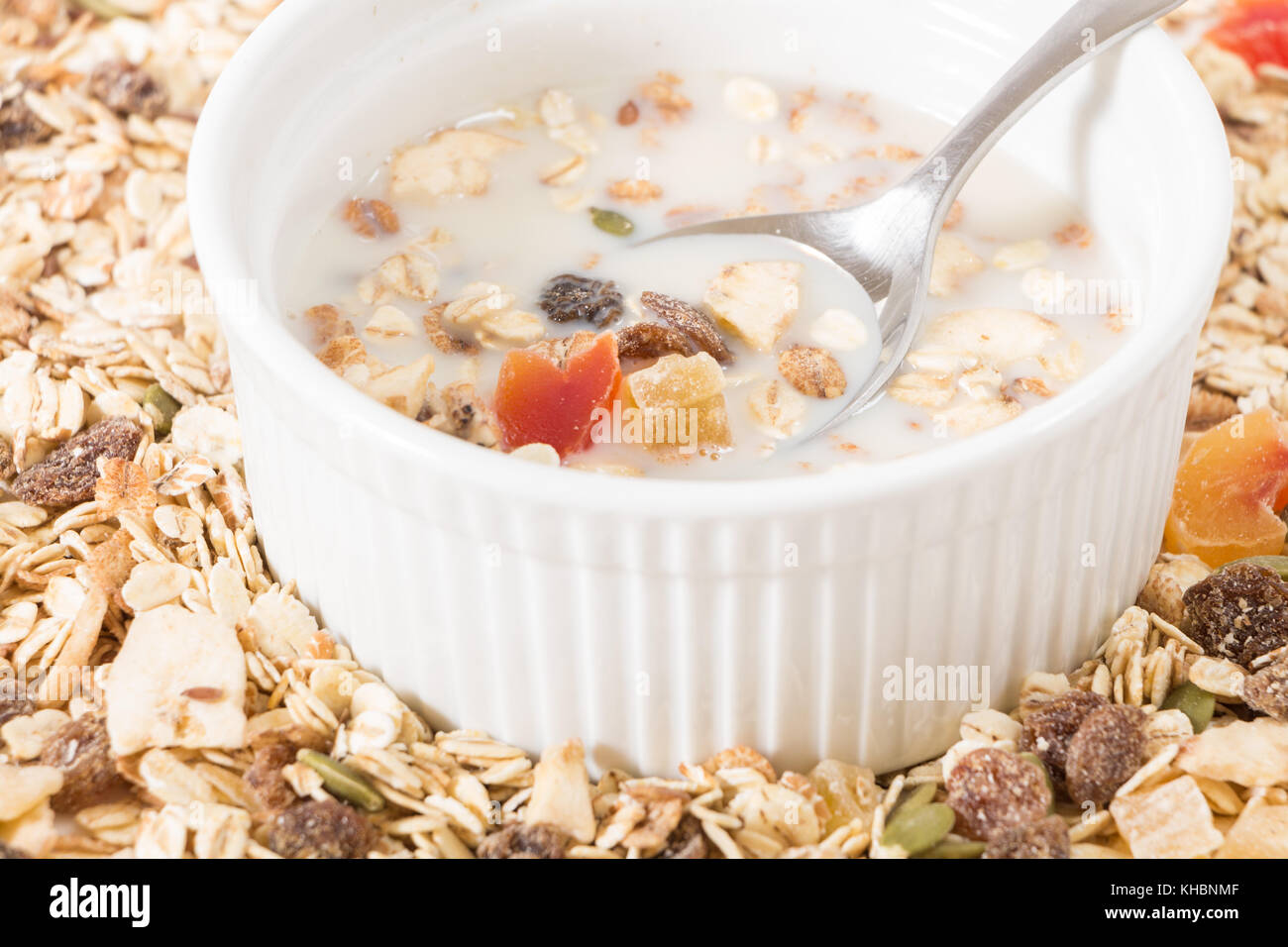Bowl of muesli dry fruits and plant milk Stock Photo Alamy