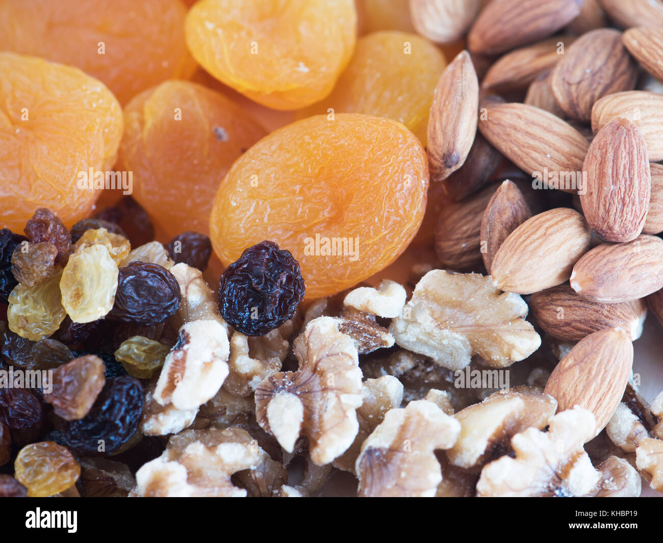 Natural background made from different kinds of nuts. Stock Photo