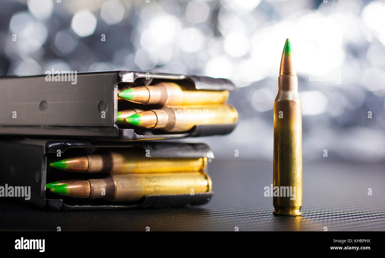 AR15 ammunition with green tipped bullets and magazines Stock Photo