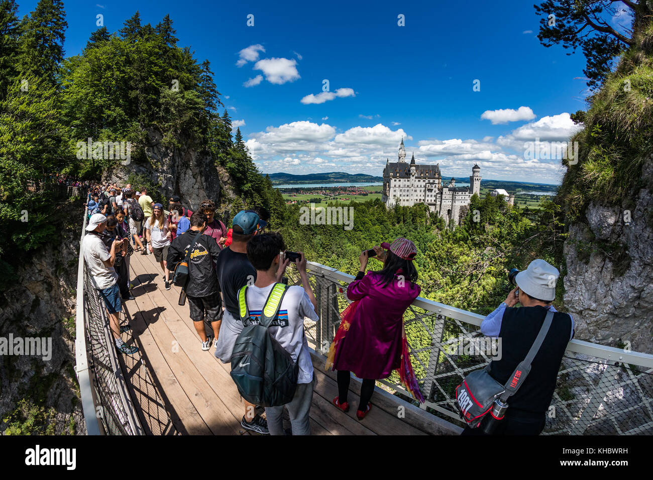 Neuschwanstein Castle, Germany - June 30, 2017: Viewing point on the bridge Neuschwanstein Castle The castle was intended as a home for the king, unti Stock Photo