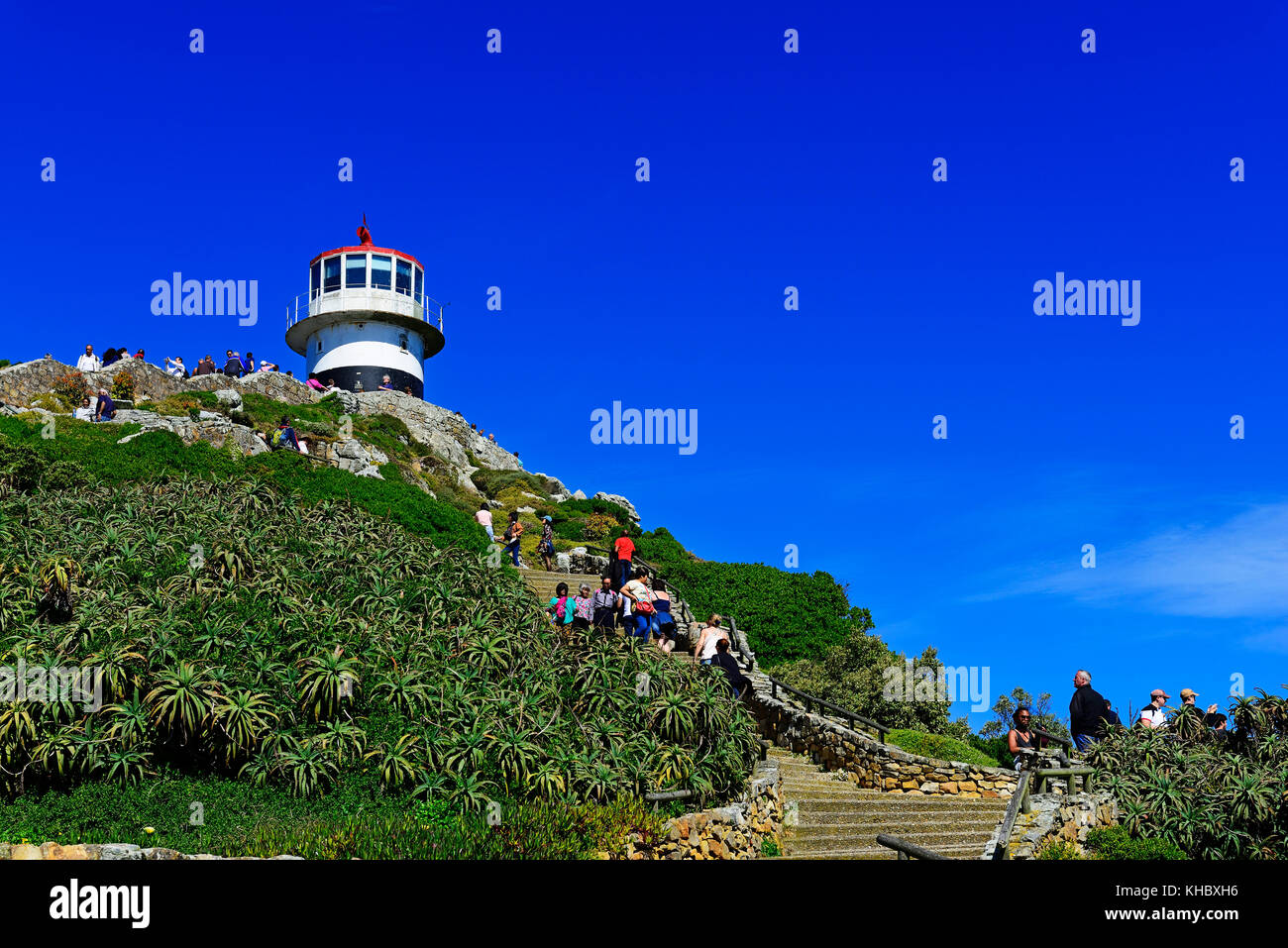 Tourists at the vantage point with lighthouse, Cape Point, Cape of Good Hope, Table Mountain National Park, Cape Peninsula Stock Photo