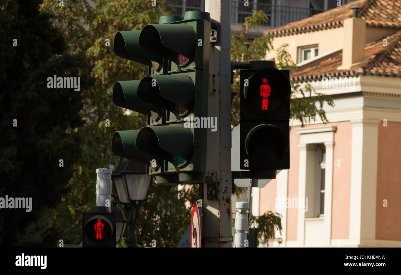 A red human street light, in the center of Athens Stock Photo