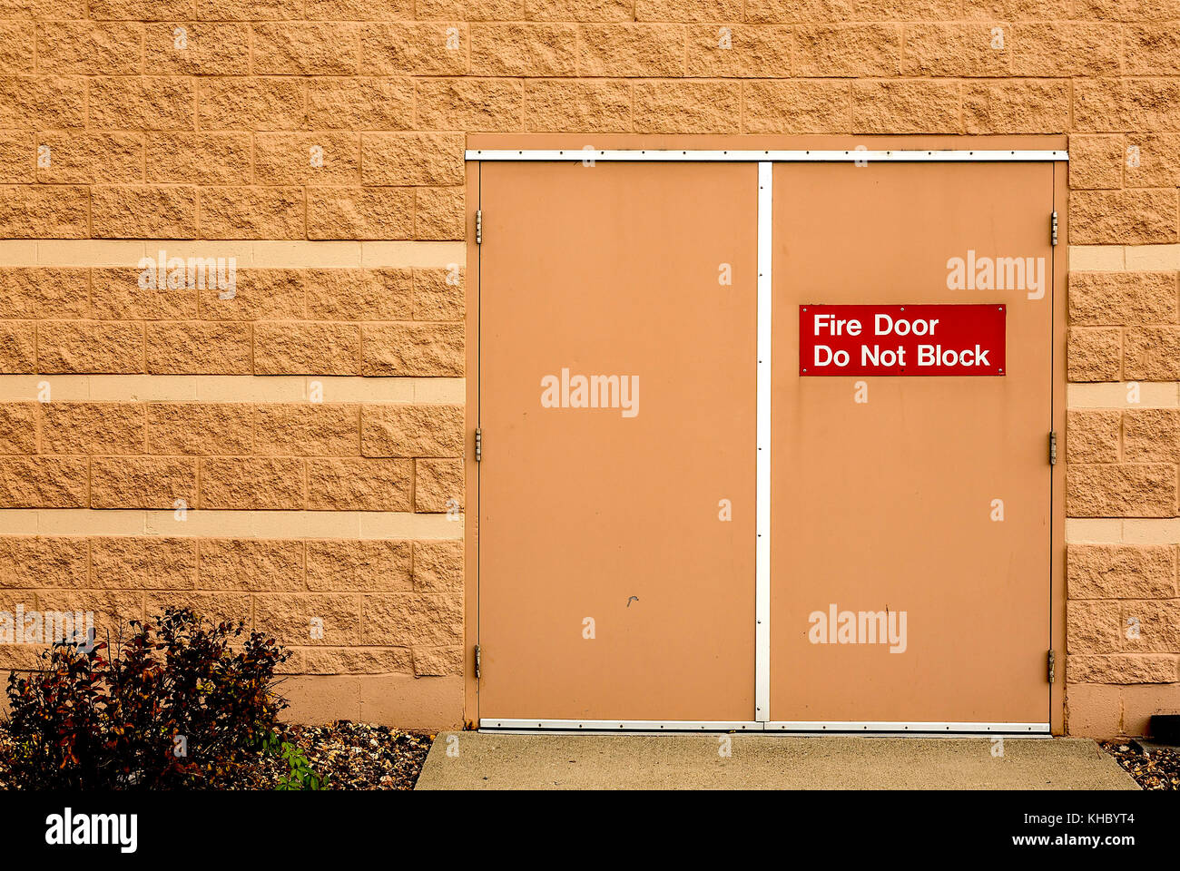 While shopping I saw this fire exit at the local mall, it struck me as very everyday, very plain. Somehow it struck me as a lonely feeling. Stock Photo