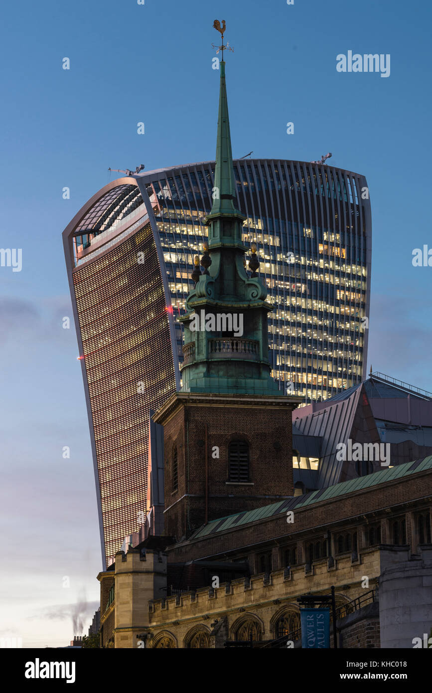 London's old and new architecture with skyscraper, the 'Walkie Talkie' building (aka 20 Fenchurch Street) and the oldest church in the City of London Stock Photo