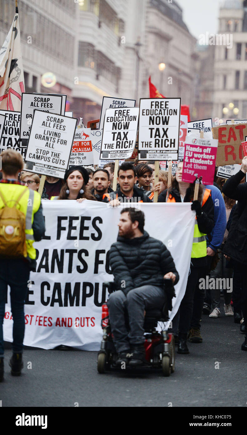 Students take part in a protest against tuition fees in central London ...