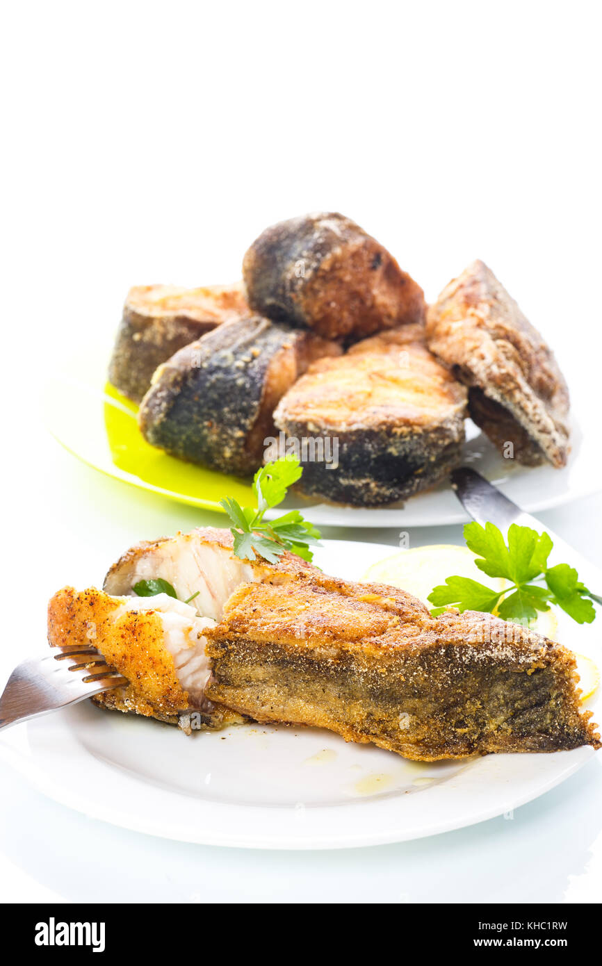 catfish roasted in batter on white background Stock Photo Alamy