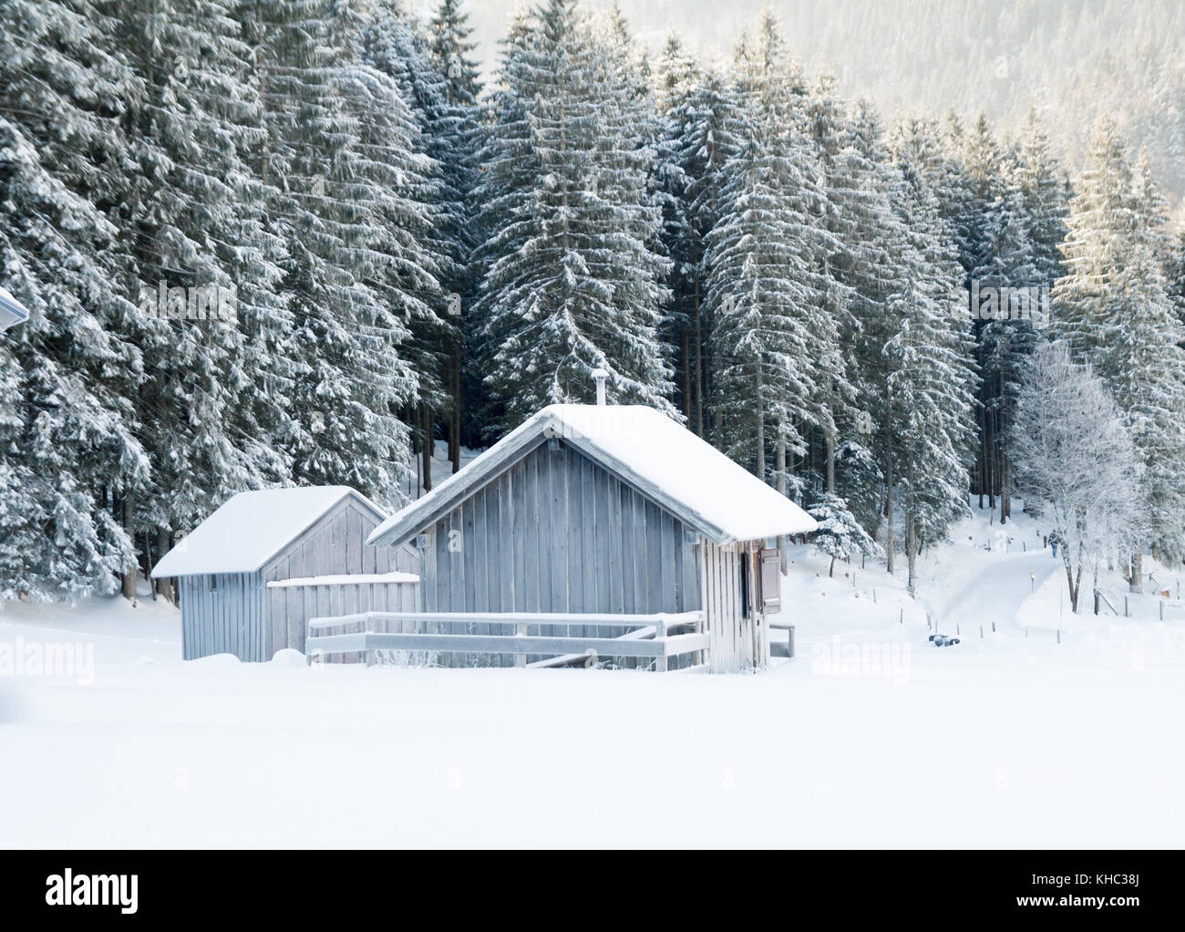 wood hut in winter snow landscape Stock Photo