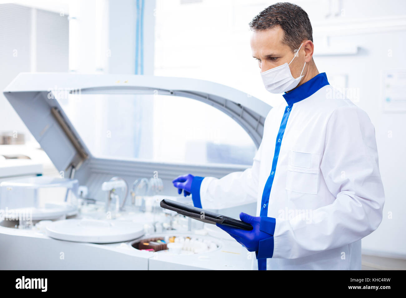 Concentrated pensive scientist  Stock Photo