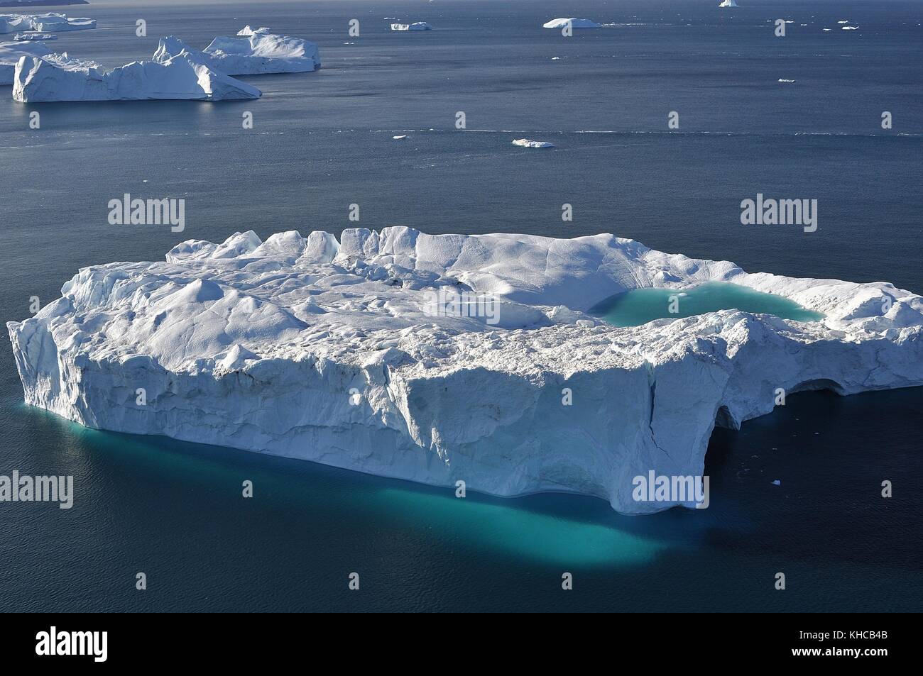 ICEBERGS ABOUT TO CALVE FROM ILULISSAT GLACIER Stock Photo