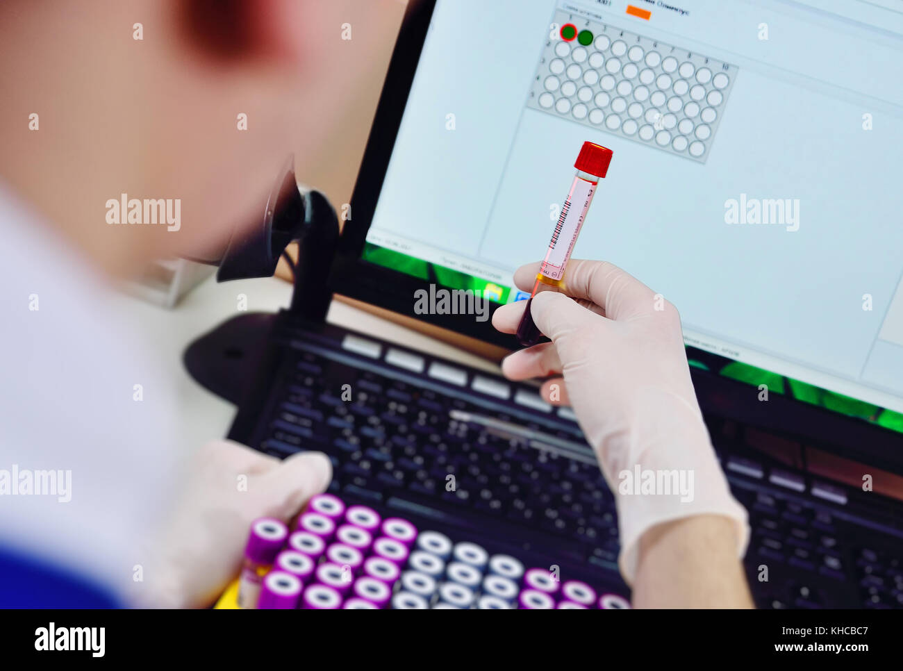 scanning bar code of test tubes Stock Photo Alamy