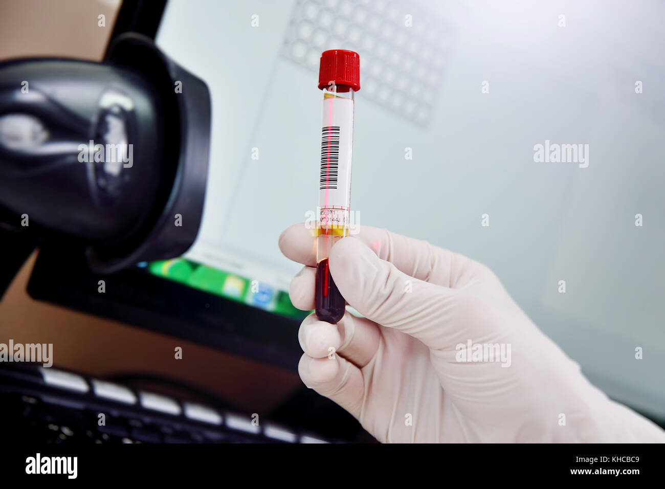 scanning bar code of test tubes Stock Photo Alamy