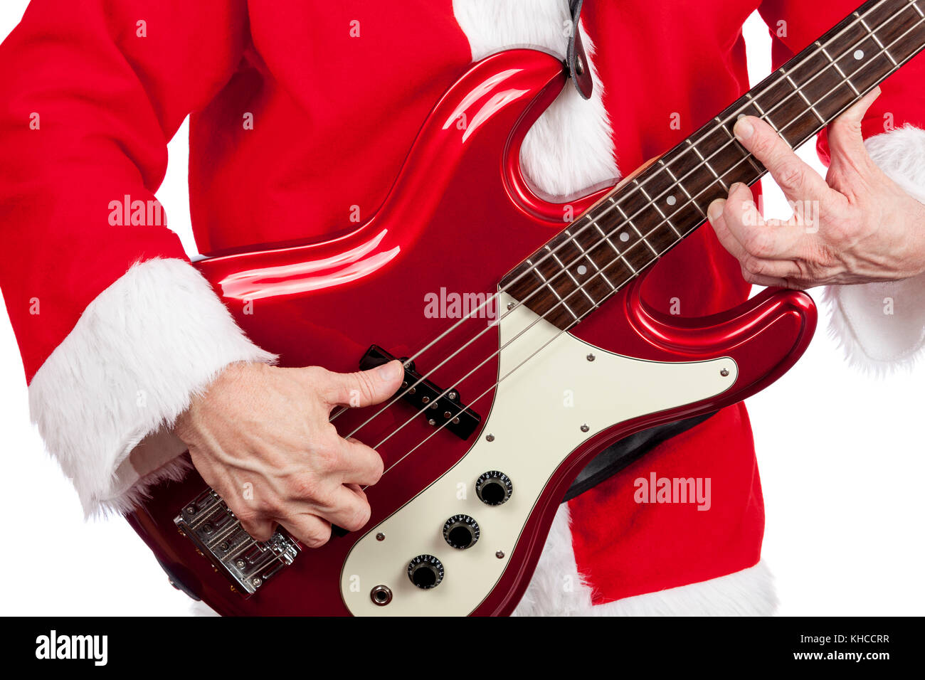 Father christmas playing a red electric bass guitar on a pure white