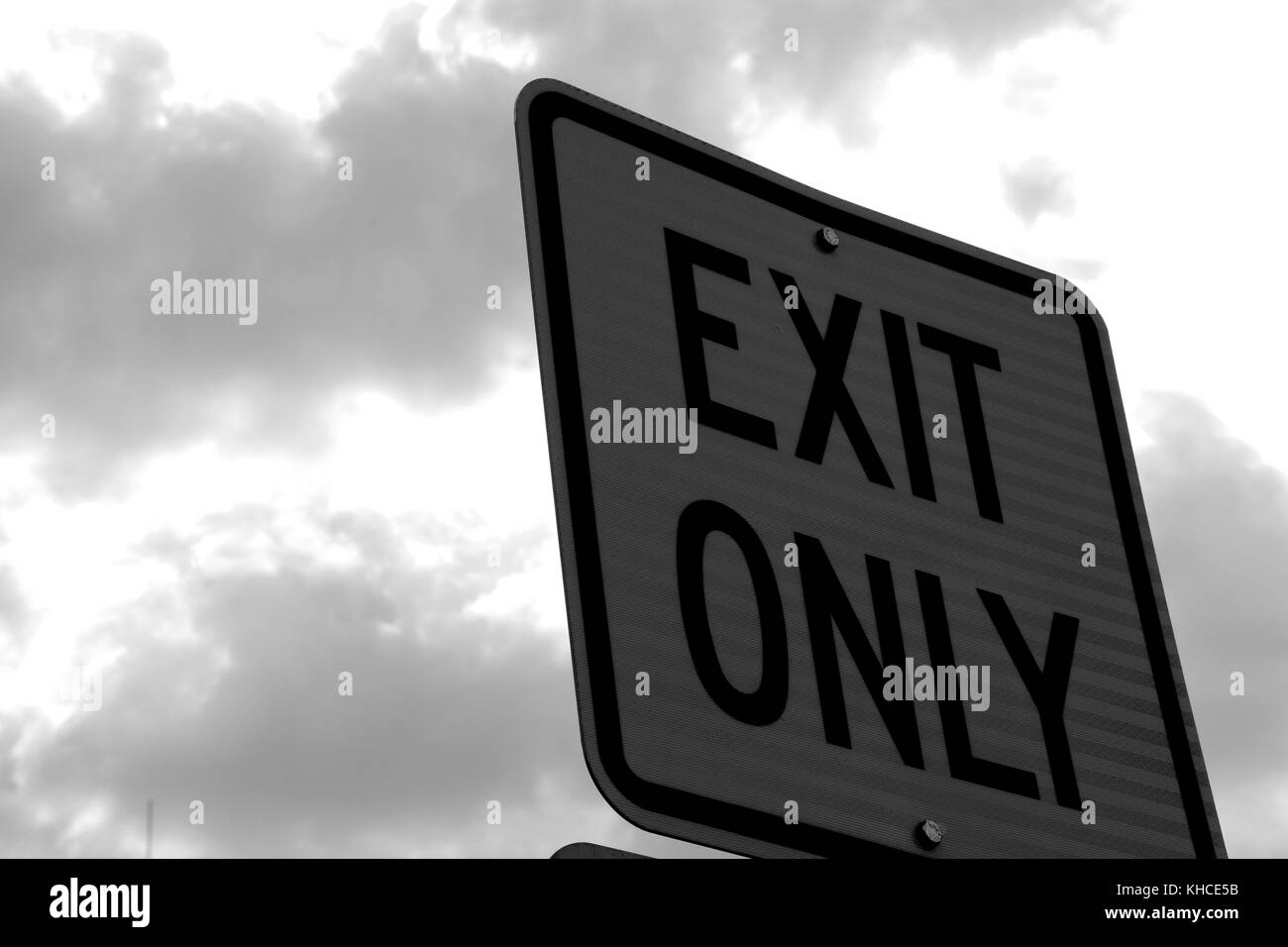 An exit sign on the edge of a street parking lot in Martinsburg, West Virginia. Stock Photo