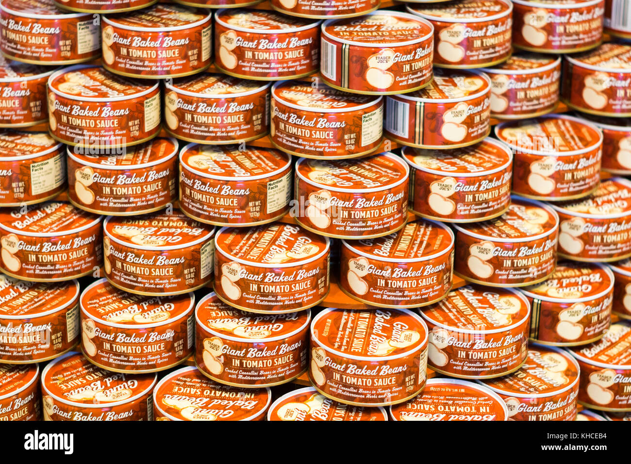A display of Trader Joe's giant baked beans in tomato sauce cans in New